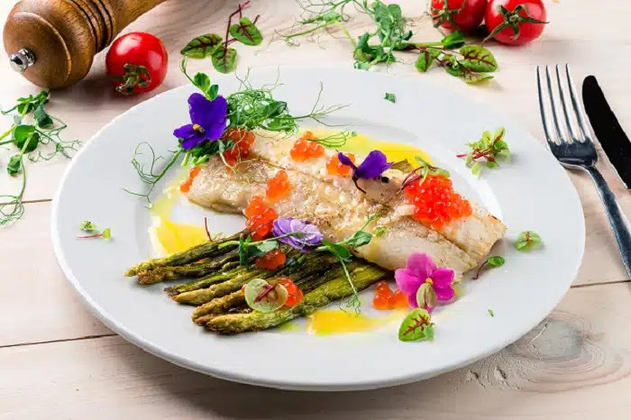 Grilled fish garnished with easy to grow edible flowers