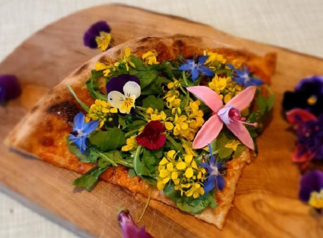 pizza with edible flowers