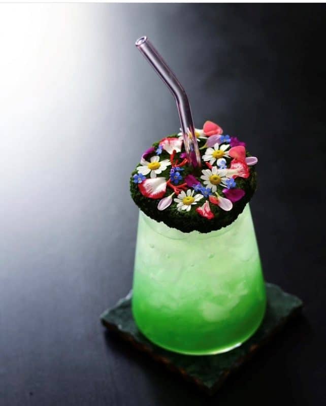 floral mocktail with edible flower garnish